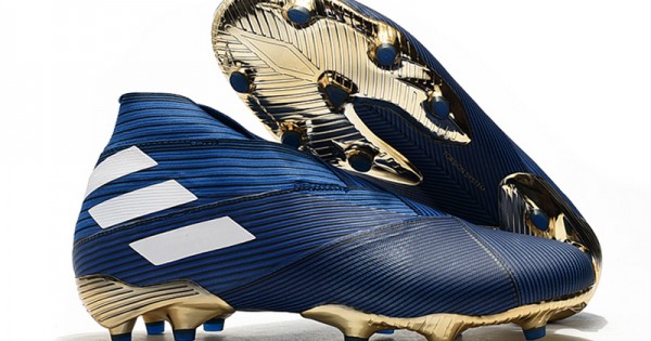 navy blue and gold soccer cleats